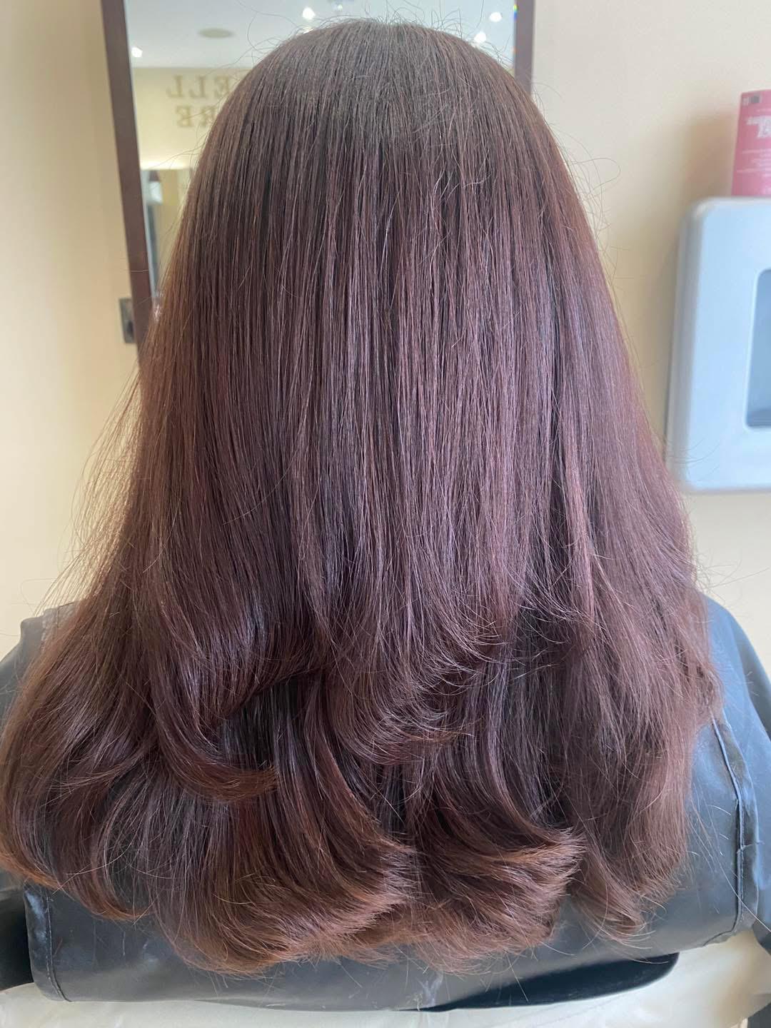 A client's mahogany brown waves