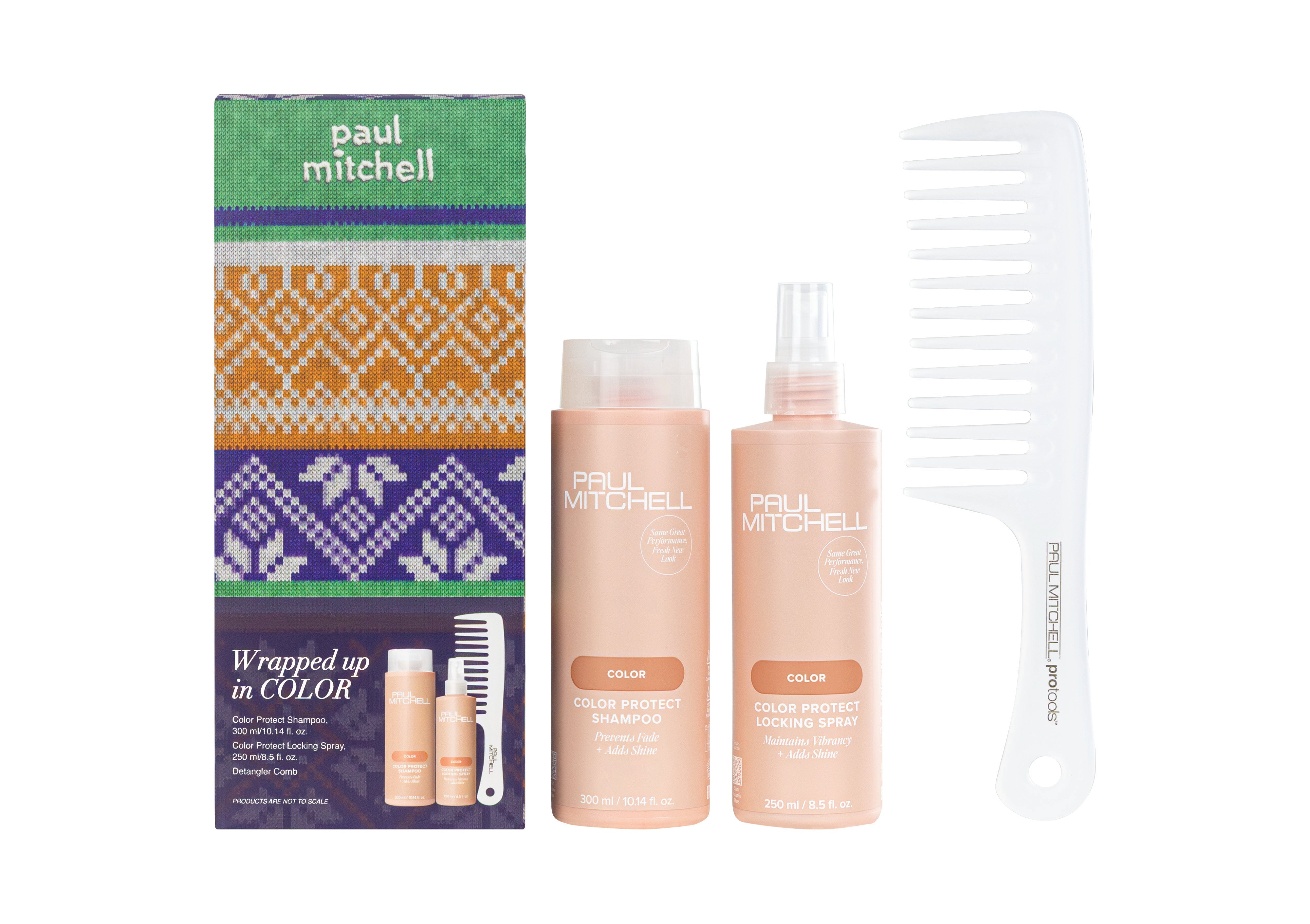 Paul Mitchell Wrapped Up in Colour gift set: Color Protect Shampoo 300 ml, Color Protect Locking Spray 250 ml and Detangler Comb beside the Christmas gift box